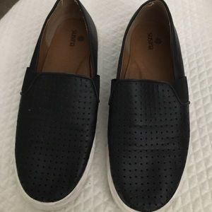 Women’s black leather slip on shoes size 8.5